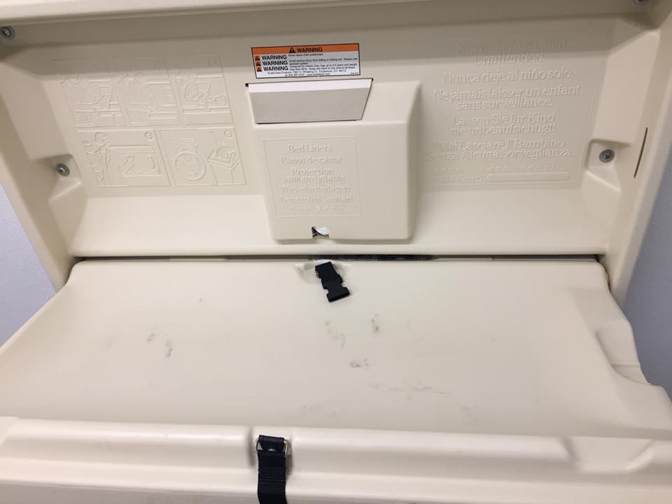 The shocking truth behind these black marks on public baby's changing table